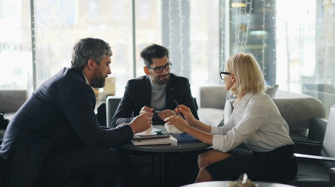 team discussing business operations